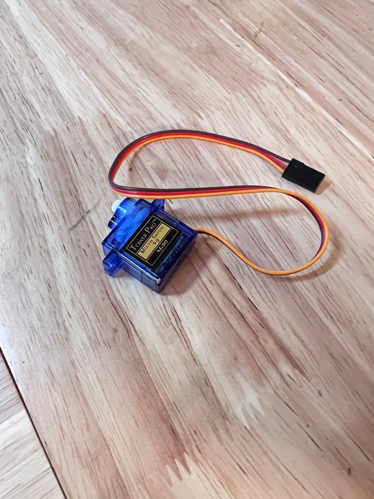 The servo that replaces it: a swing I can actually command.